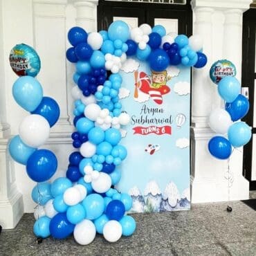 Party board with balloon garland